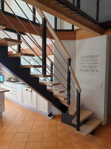 Escalier quart tournant limon central